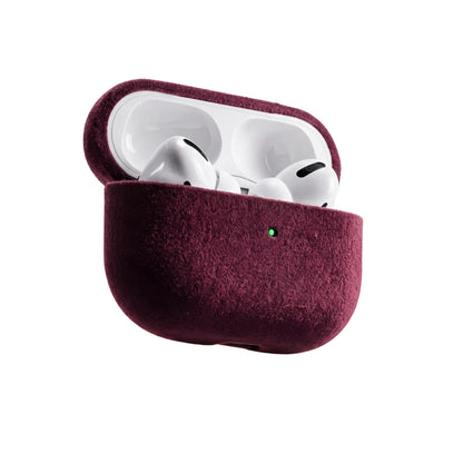 Velluto AirPods Case in Burgundy, open with the AirPods inside