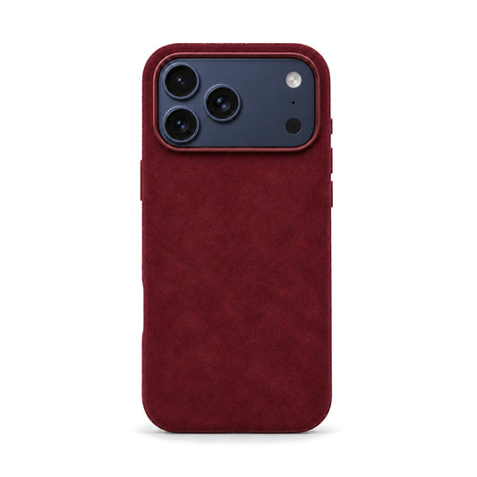 Velluto Case in Wine on a Deep Blue iPhone 17 Pro