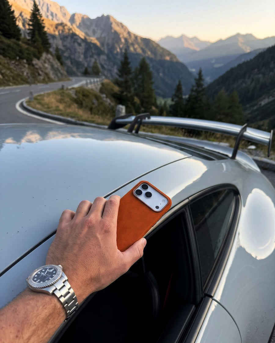 Orange Velluto Case on the roof of a 911 in the Alps